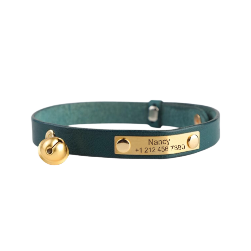 Green leather cat collar with a gold bell and personalized gold name tag reading 'Nancy' with a phone number. Bell of Gold Leather Cat Collars by Petcustomi.
